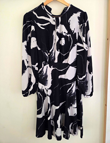 Next tall black white - next,