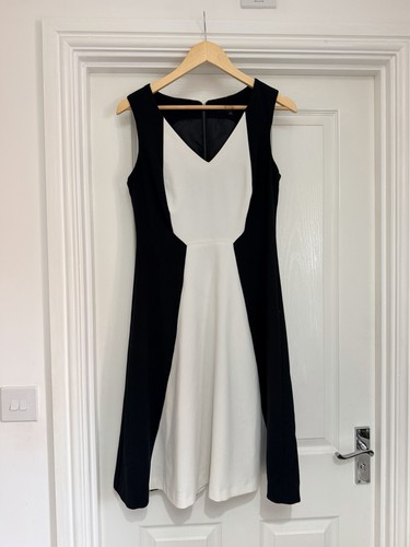 Next size black white - next,